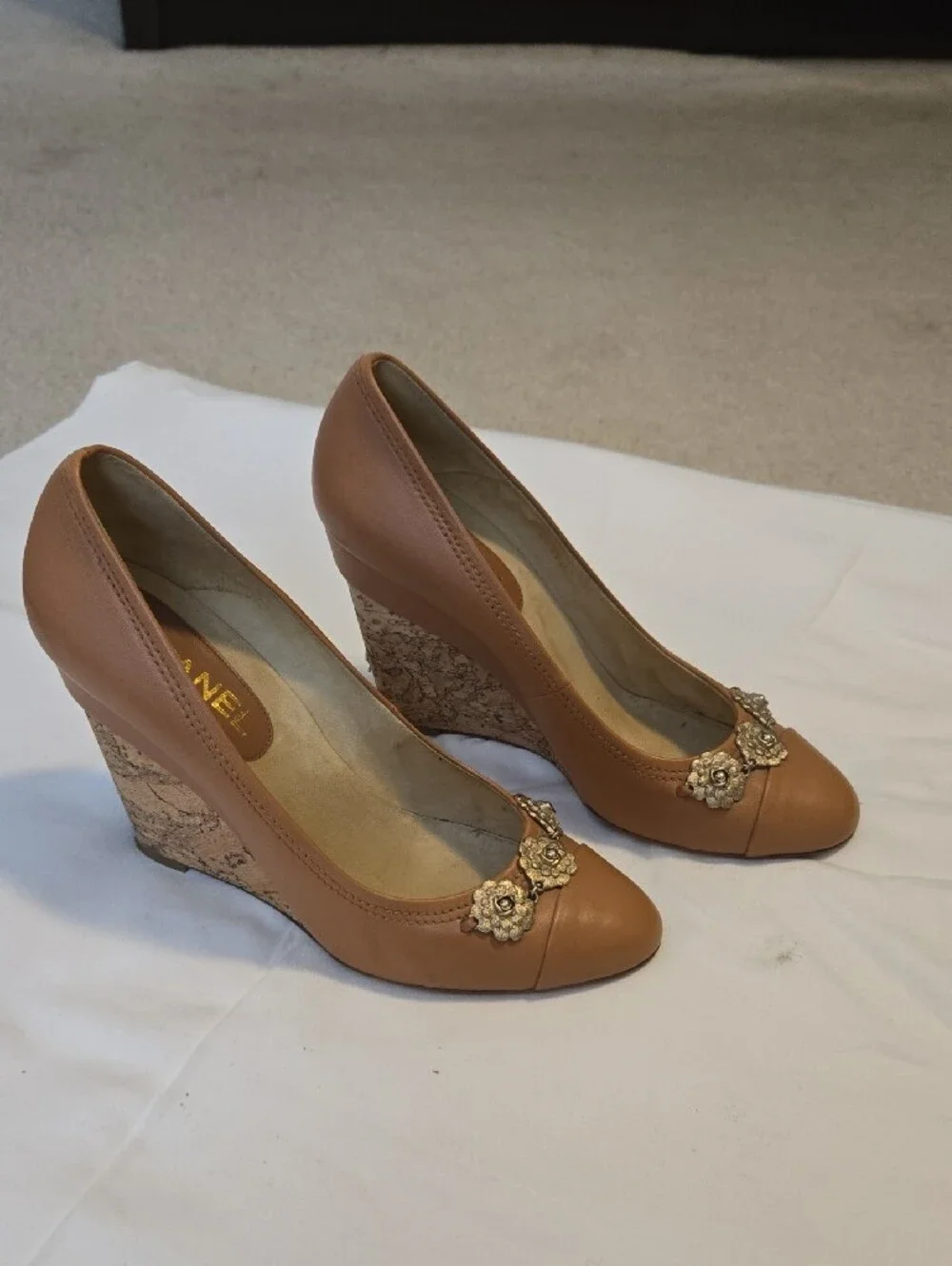 CHANEL Tan Leather Pumps with Gold Floral Accents